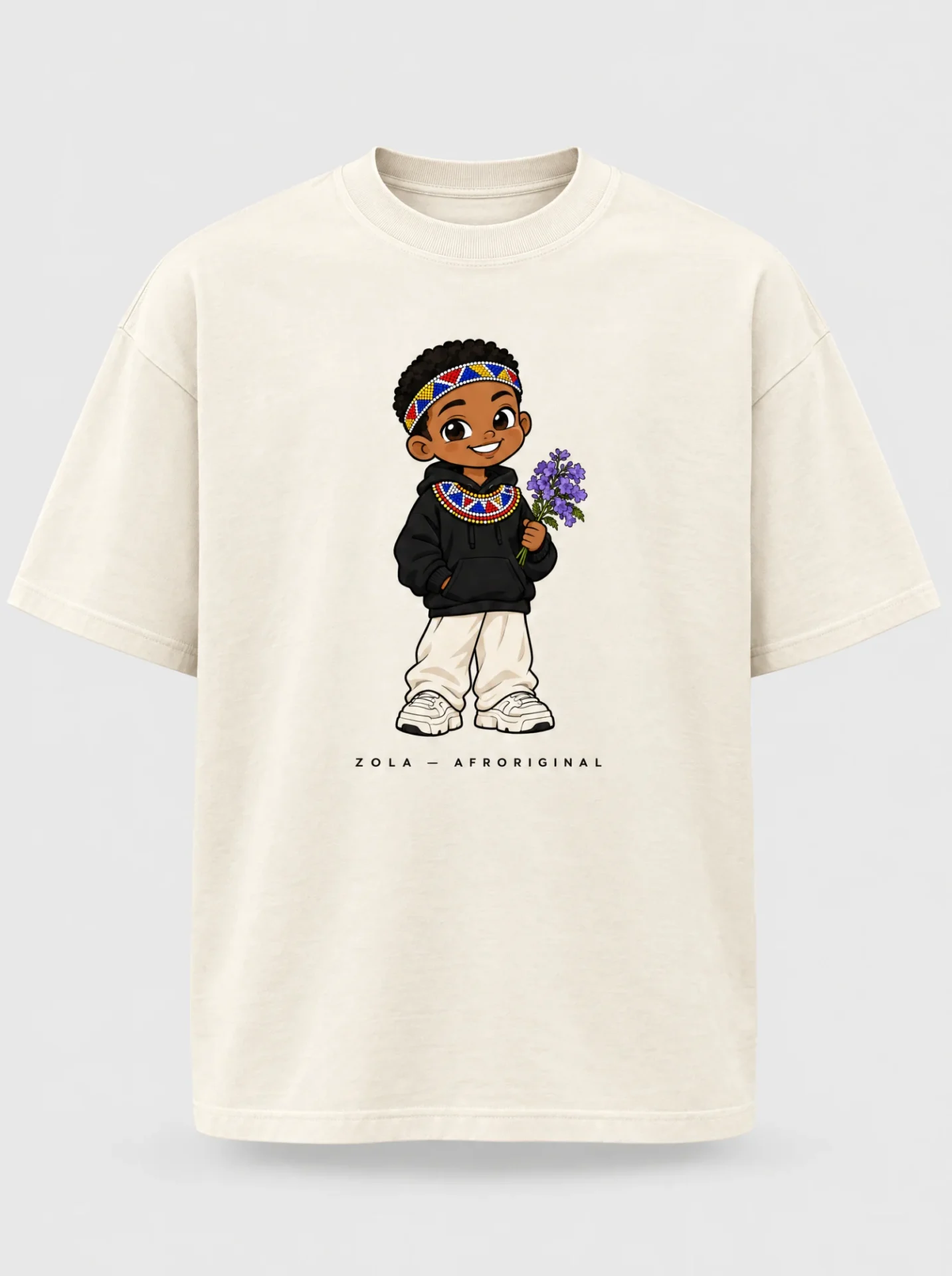 Cream T-shirt printed with Zola, the Afroriginal cartoon mascot wearing a beaded headband and collar and holding jacaranda blossoms